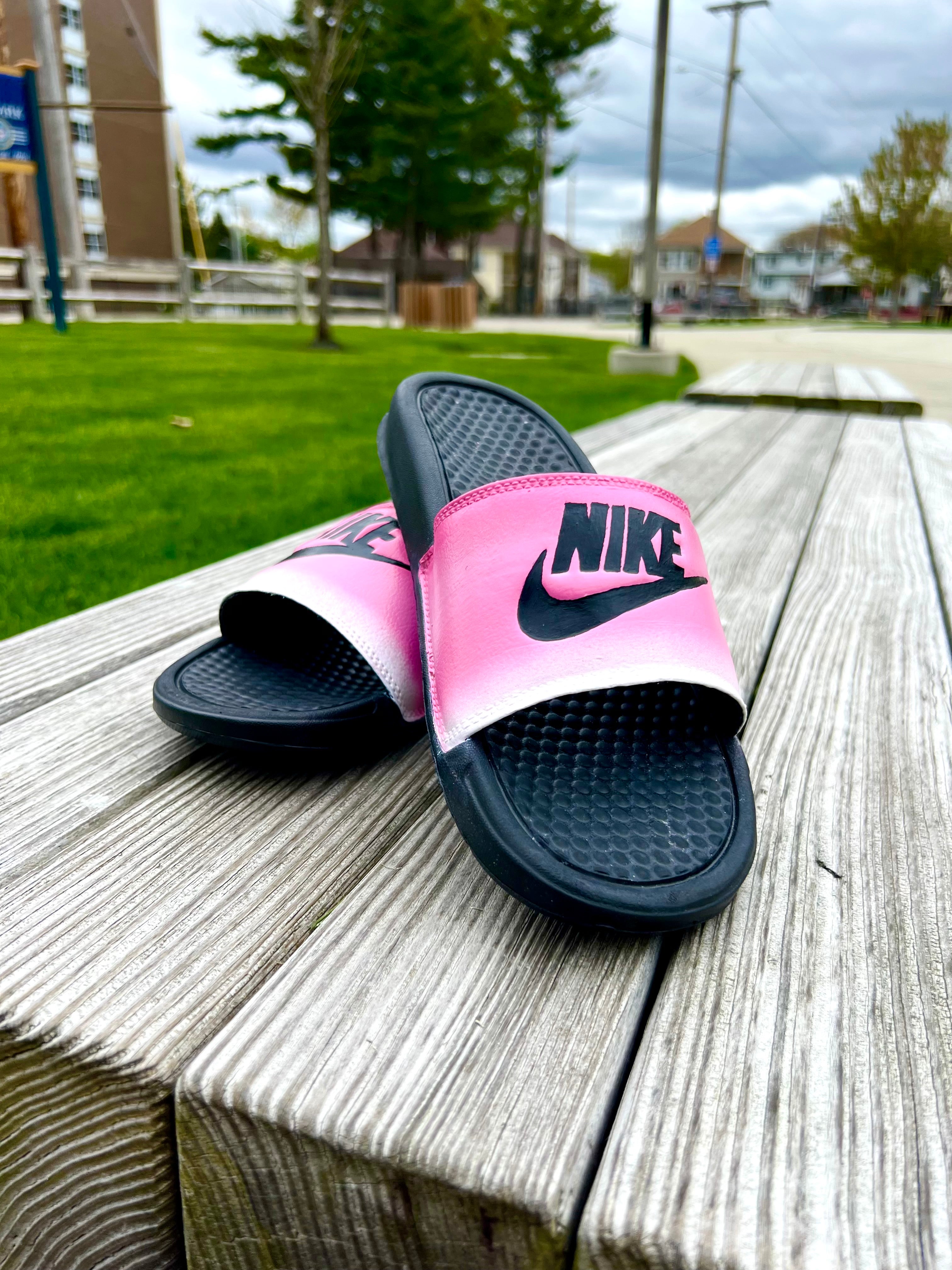 Black and 2025 pink nike sliders